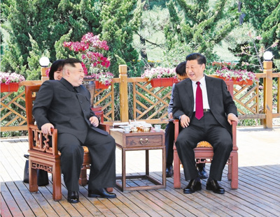 习近平同朝鲜劳动党委员长金正恩在大连举行会晤